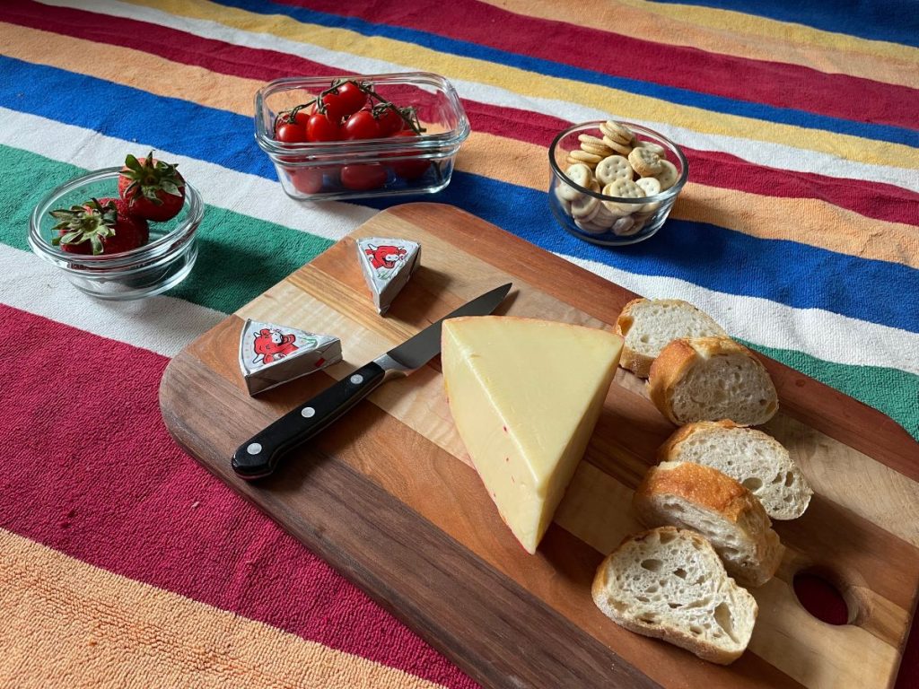 picnic spread on a picnic blanket: how to pack for a picnic