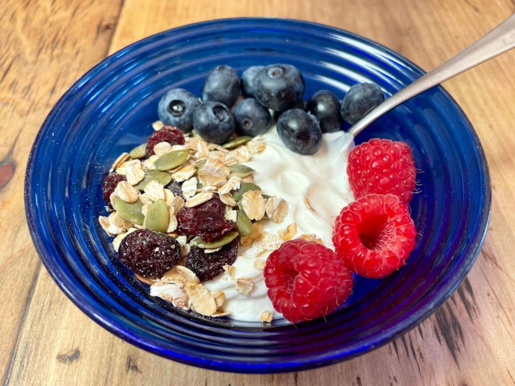 healthy yogurt bowl: an example of an answer to the question what should I eat during perimenopause and menopause