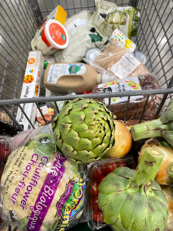 full grocery cart thanks to a grocery list